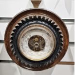 Small wheel barometer in oak case, 17cm diameter