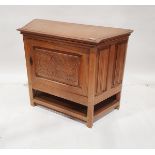 Oak side cabinet, the chamfered sides with linenfold panelling, foliate scroll carved panel to the
