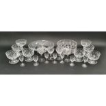 Collection of cut and engraved table glass including a large bowl, another flared form, six shaped