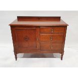 Oak sideboard, on rectangular moulded top above three drawers flanked by one cupboard, on turned and