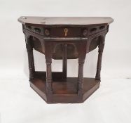 Antique oak side table with drop-leaf, single drawer, on turned arched supports and plinth base