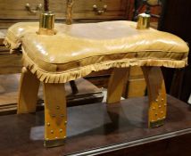 Brass studded stained wood and leather camel stool with fringed leather top and brass caps