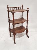 Stained wood three-tier whatnot with galleried top above three shaped shelves, on cabriole front