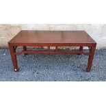 Brown painted hardwood coffee table, 42cm high x 100cm wide x 50cm deep