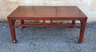 Brown painted hardwood coffee table, 42cm high x 100cm wide x 50cm deep