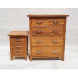 Modern oak chest of drawers with rectangular top over two short, three long drawers on square feet H
