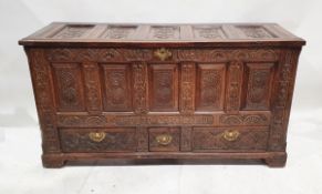 Antique oak dower chest with fielded panels and later carving, later dated "1681" three short