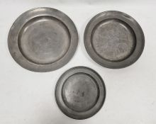 Three 18th century pewter dishes, various touch marks to reverse, the smallest engraved MGB and with