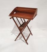 Stained wood magazine stand together with a mahogany butlers tray (2)