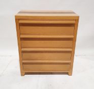 Contemporary oak veneered chest of drawers with four graduated long drawers, on tapering feet, 87.