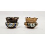 Two late 19th century Doulton Lambeth stoneware small compressed globular vases, impressed marks,