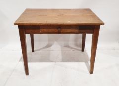 Oak kitchen table, early 20th century, the plank top above frieze drawer and square tapering legs,