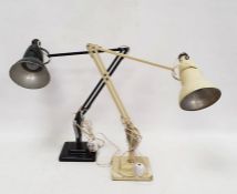 Two vintage Herbert Terry, Redditch anglepoise lamps, in black and cream. Please note: Plugs and