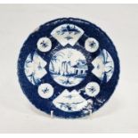 Worcester powder blue ground plate, circa 1765, with Chinese style character marks, painted with