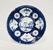 Worcester powder blue ground plate, circa 1765, with Chinese style character marks, painted with