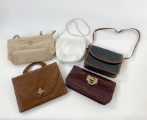 A vintage Asprey shoulder bag, black with tan trim, shoulder strap, labelled inside 'Asprey' with