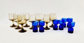 Set of eight Libbey 'Tawny Accent' glasses and a set of seven Scandinavian-style blue glass drinking
