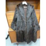 A vintage full length mink coat, broad, deep cuffs