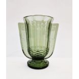 Val St Lambert 'Romeo' pattern winged green glass vase on circular stemmed base, 21.5cm high