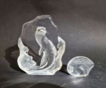 Mats Jonasson Swedish crystal paperweight depicting an otter and a clear glass hedgehog paperweight,