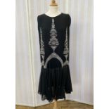 Black chiffon embroidered 1920's/30's dress heavily embellished with white, silver, grey beaded