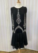 Black chiffon embroidered 1920's/30's dress heavily embellished with white, silver, grey beaded