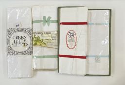 Five Irish linen double sheets, unused, with original packing, two packs have rust marks, and