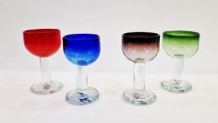 Set of four Viivi-Ann Keerdo late 1990's coloured glasses in red, blue, green and amethyst, with