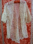 Edwardian machine bobbin lace jacket, and an Edwardian cotton skirt, embroidered, flounced, some