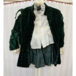 Mid 19th century boy's bottle green velvet jacket, waisted, with frock hem, numerous button details,