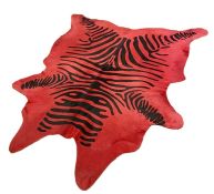 A large cow hide fur rug, dyed red with black stripes 'a la Zebra' Condition ReportApprox 205cm x