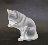 Lalique model cat cleaning paw, with etched mark to base and labelled to base, 12.5cm high
