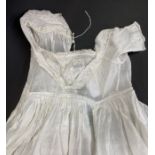 A matching pair of lace edged handkerchiefs, christening gown, possibly Ayrshire whitework, and a