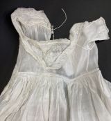 A matching pair of lace edged handkerchiefs, christening gown, possibly Ayrshire whitework, and a