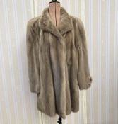 Silver grey mink three quarter length jacket, large with padded shoulders and a vintage fox