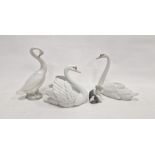Two Lladro models of swans, naturalistically modelled, one swan with wings outstretched, 21cm
