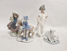 Lladro model of polar bears, the mother with two cubs on an iceberg, a Lladro figure of a girl