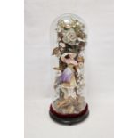 Victorian bisque porcelain figure of a lady under glass dome, on ebonised stand, modelled as a