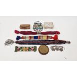 Three miser's purses, a beadwork purse, a beadwork small panel, a mother-of-pearl rectangular box, a