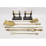 Pair iron and brass fire dogs with turned finials and five brass fireside implements