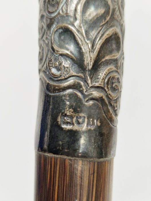 Silver-mounted bone handled ebonised walking cane, bamboo walking stick with silver collar and a - Image 3 of 3