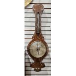 Early 19th century banjo barometer, the rosewood case inlaid with floral mother of pearl motifs,