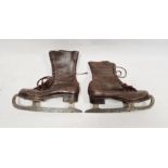 Pair vintage brown leather lady's skates with lace up boots