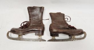 Pair vintage brown leather lady's skates with lace up boots