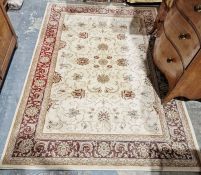 Modern 'Colours' by B&Q cream ground rug with floral pattern, multiple floral borders 230cm X 160cm