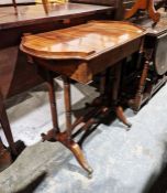 Edwardian box top writing table with lift-up lid, turned supports, united by stretchers, on brass
