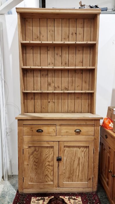 Pine dresser with shelves above drawers and cupboard below, 112cm wide