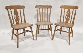 Five assorted pine kitchen chairs (5)