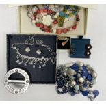 Quantity of costume jewellery to include clip-on earrings, necklaces, etc (1 box)