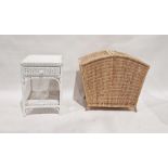 Canework double laundry basket and a white painted cane occasional table with drawer and